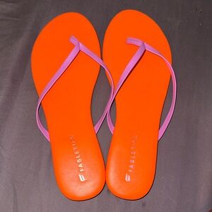 Brand new Fabletics Orange Footbed with Pink Straps Flip Flops